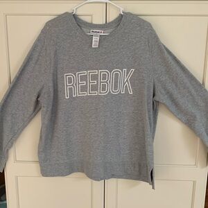 Women’s gray Reebok 1X sweatshirt.